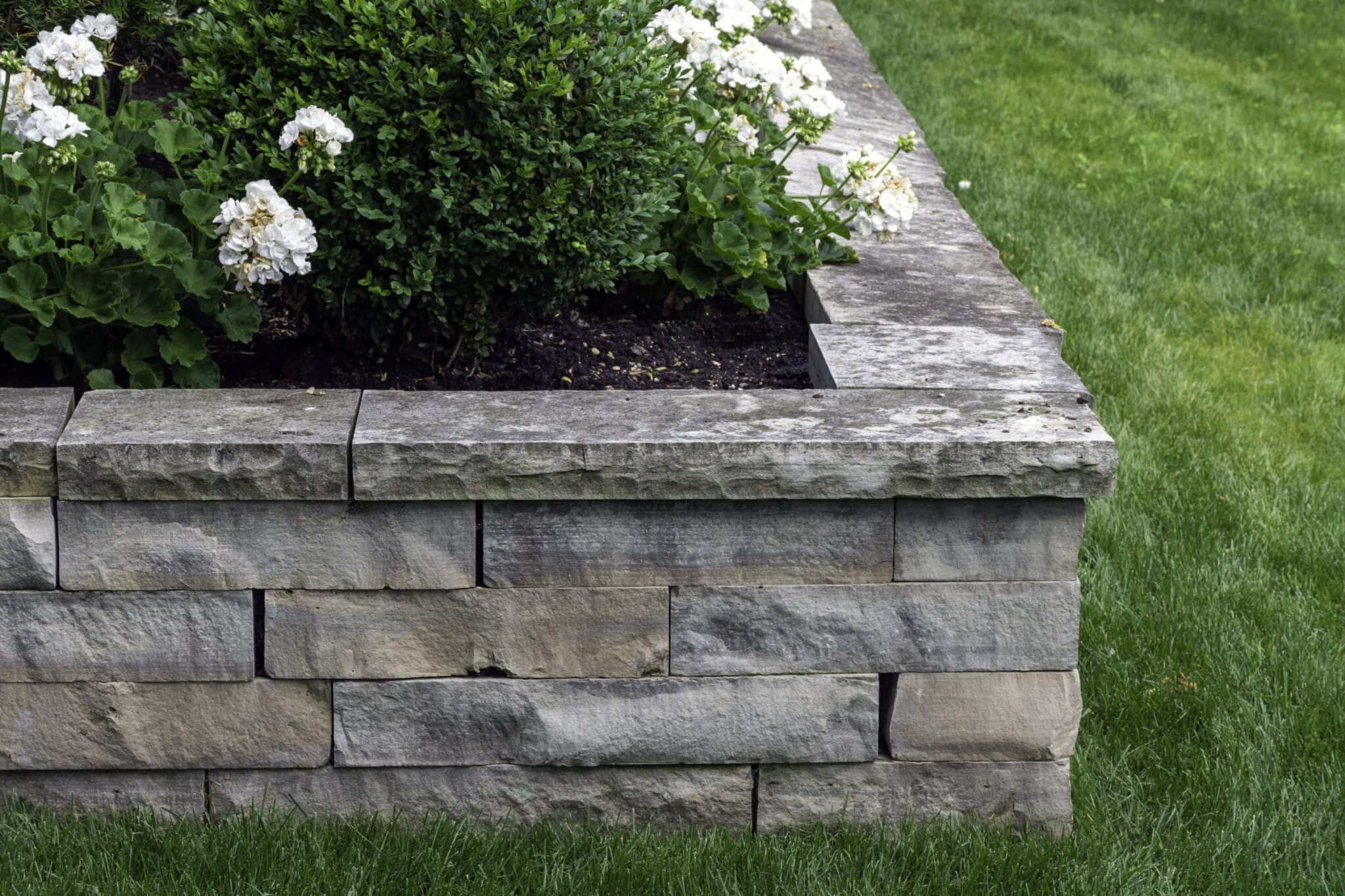 How To Build A Raised Flower Bed With Natural Stone Hilton Landscape 